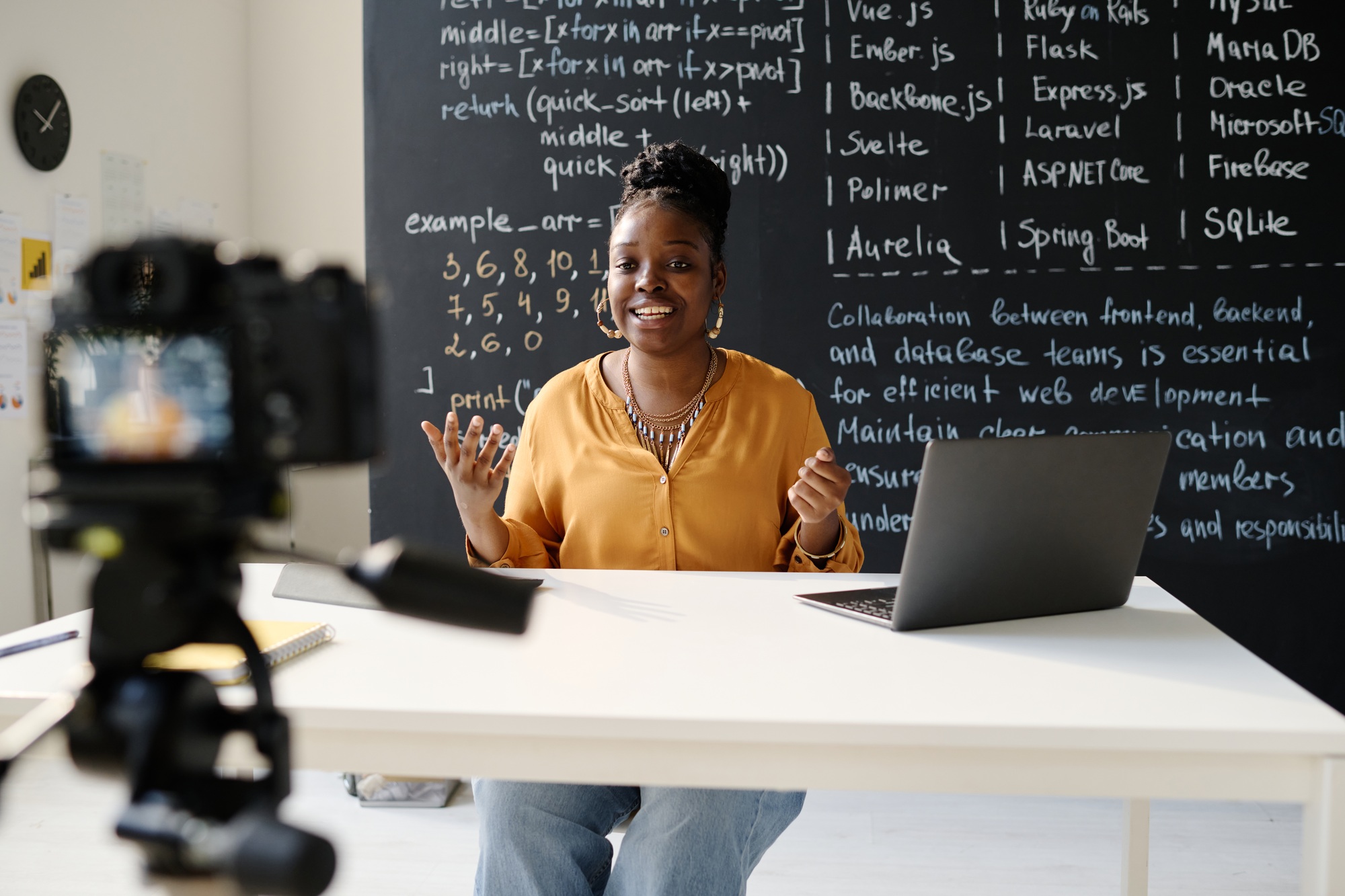 Teacher recording her blog about IT